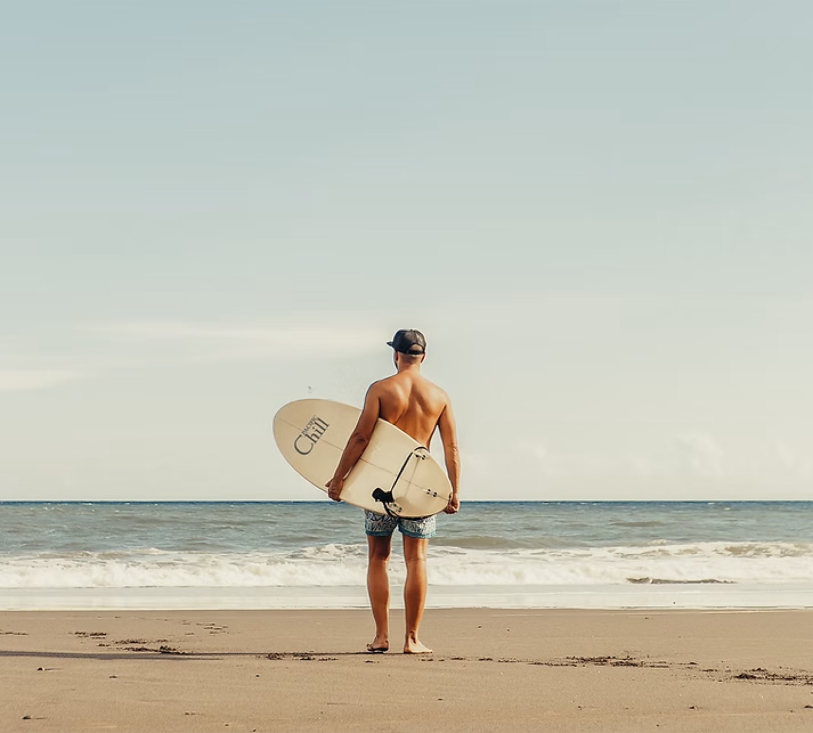 Surfer at the shoreline